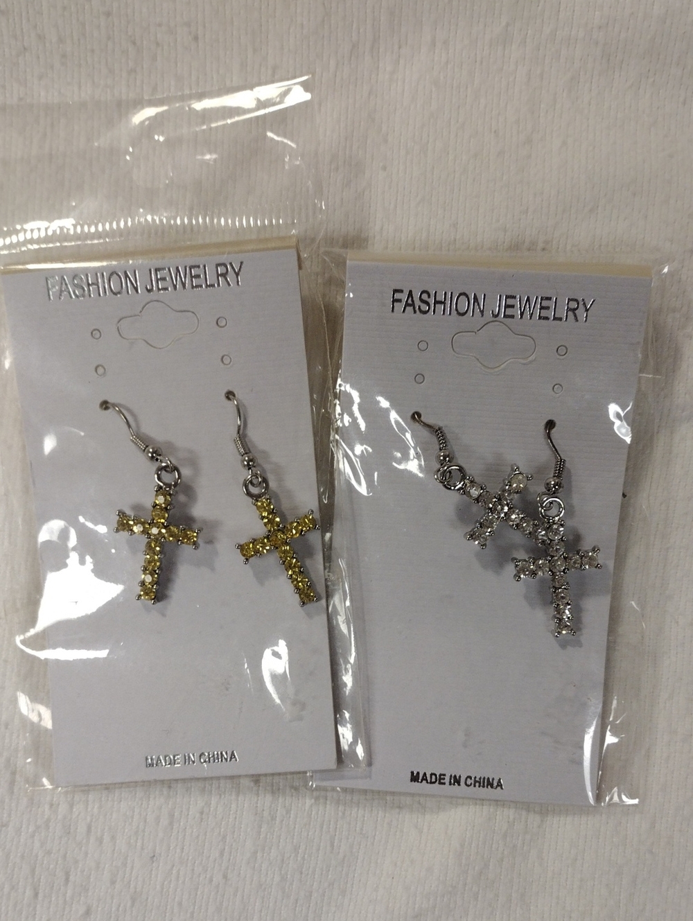 Set of 2 new w/ tags diamond yellow & white cross for pierced ear great gift